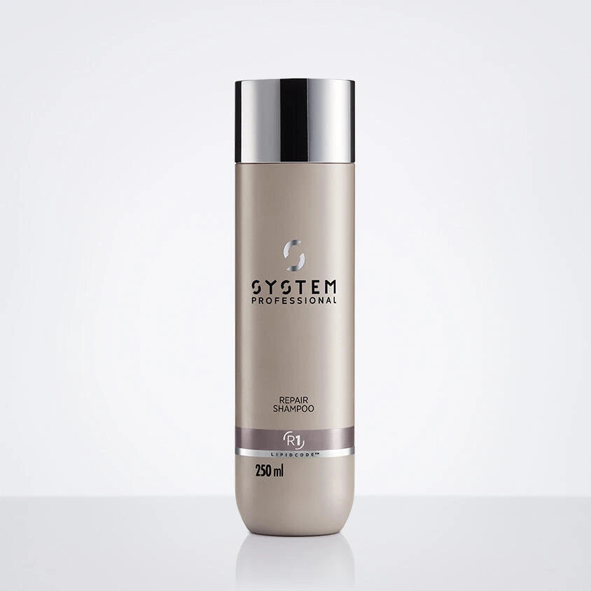 Dies ist ein Bild einer braunen Repair Shampoo Flasche mit weißem Hintergrund.