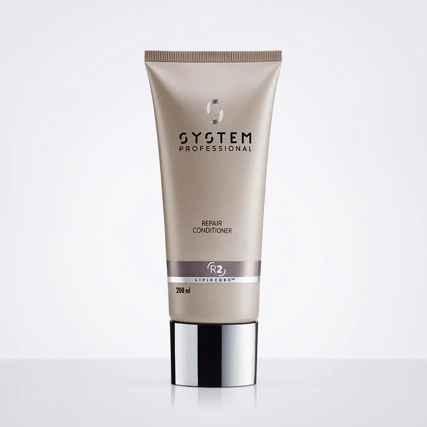 Dies ist ein Bild einer braunen Repair Conditioner Flasche mit weißem Hintergrund.