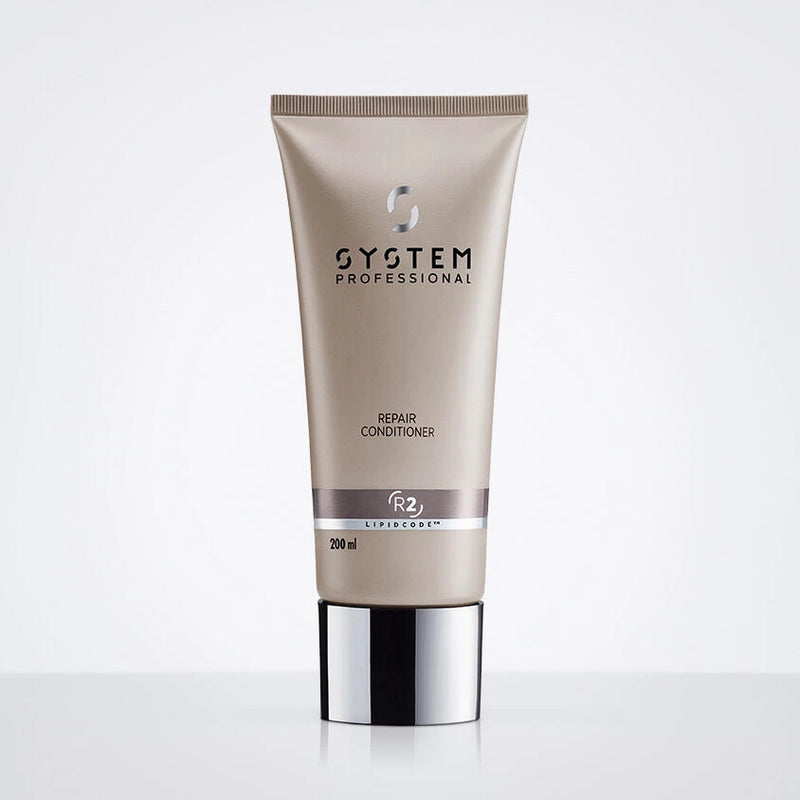 Dies ist ein Bild einer braunen Repair Conditioner Flasche mit weißem Hintergrund.
